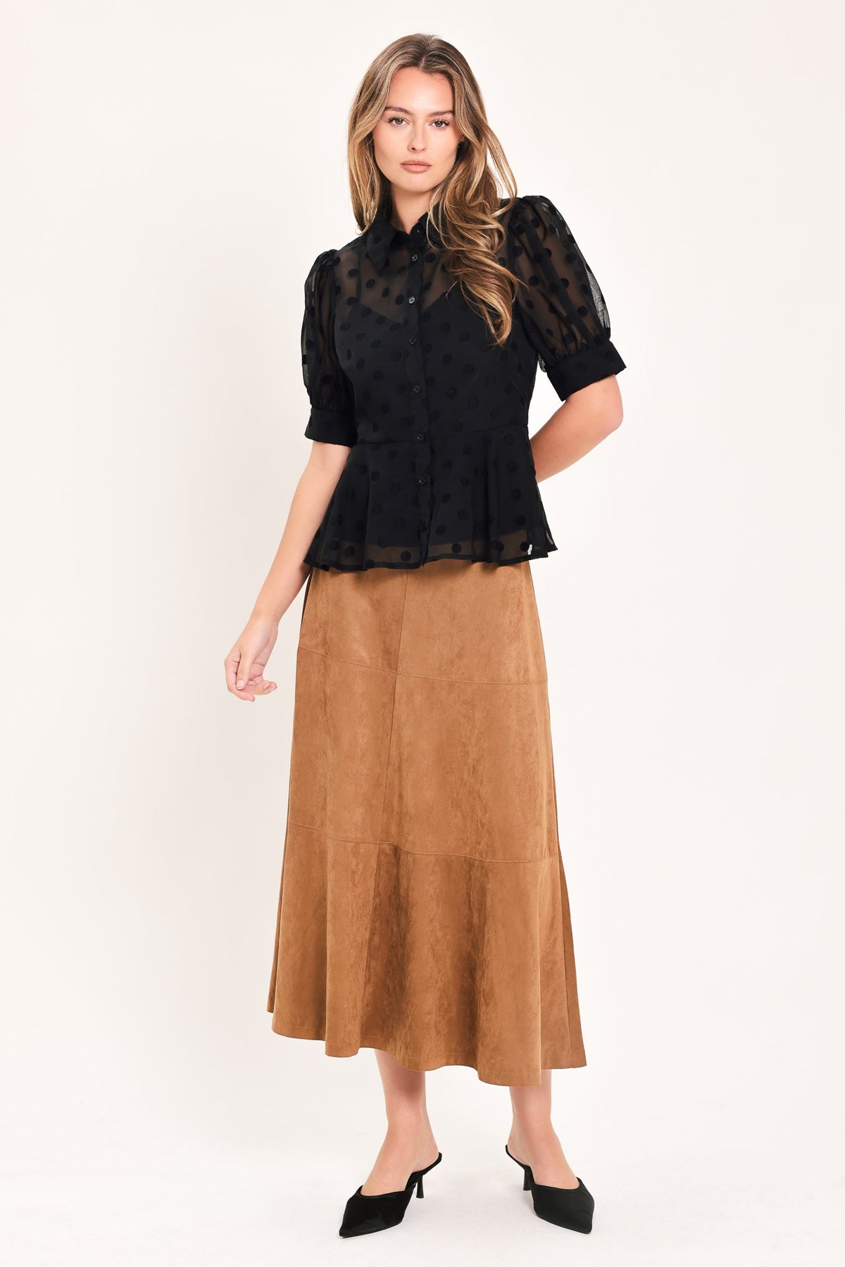 Polka Dot Puff Sleeve Peplum Top in black, detail