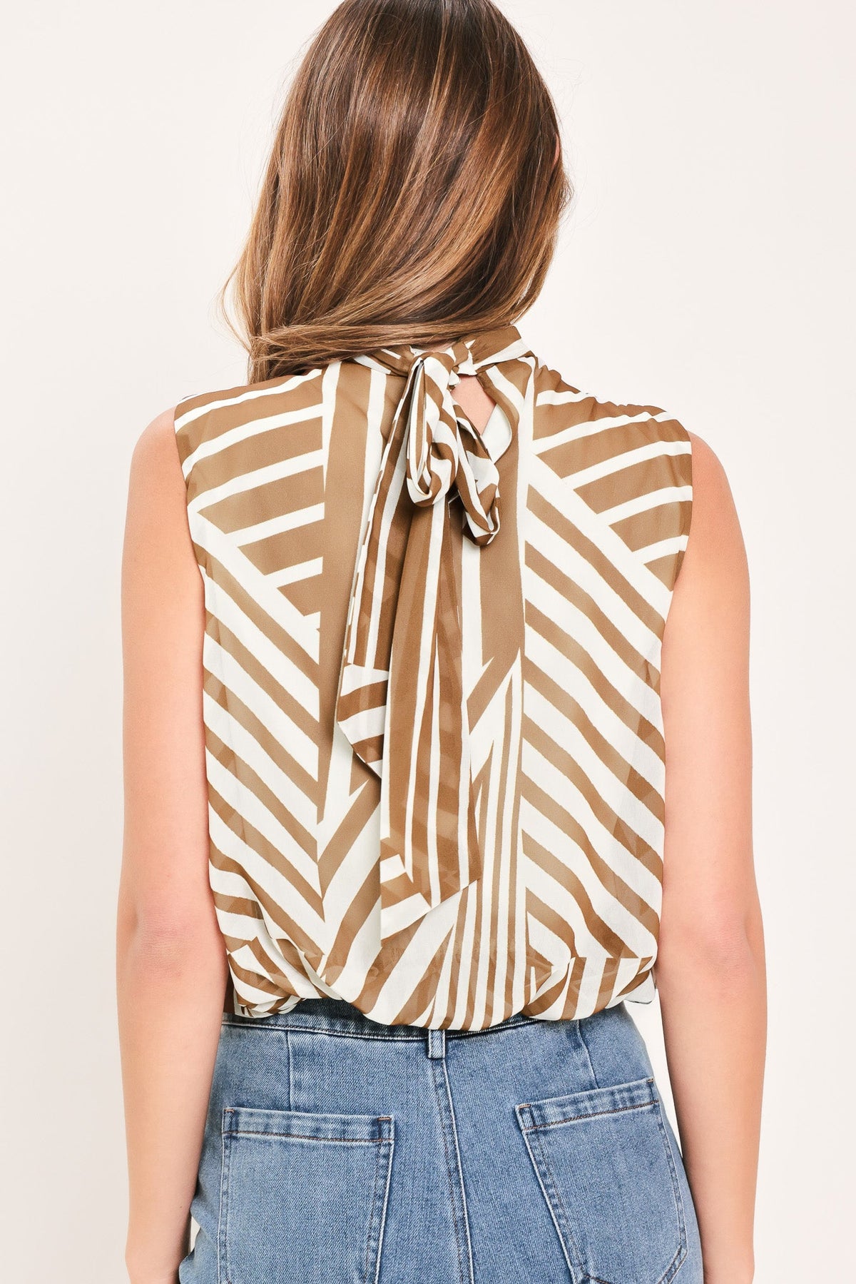 Ribbon Tie-Back Bubble Hem Woven Top in mocha, close-up