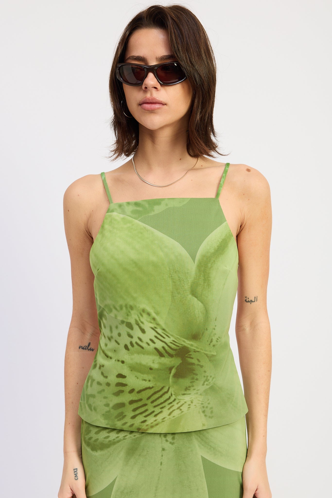 Natalia Mesh Top in Green Floral - front view showing sleeveless silhouette
