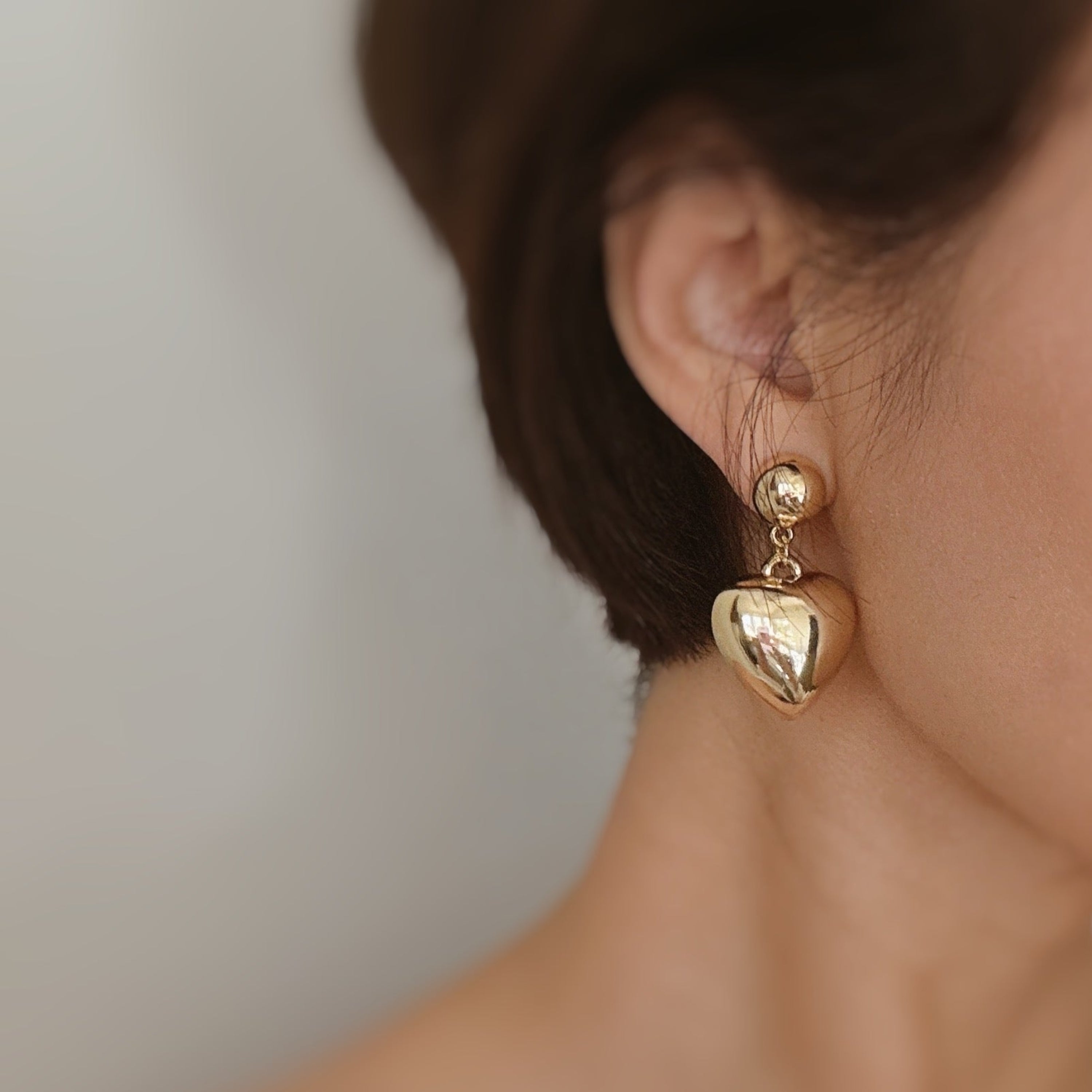 Puff Dangle Heart Earrings - styled on model