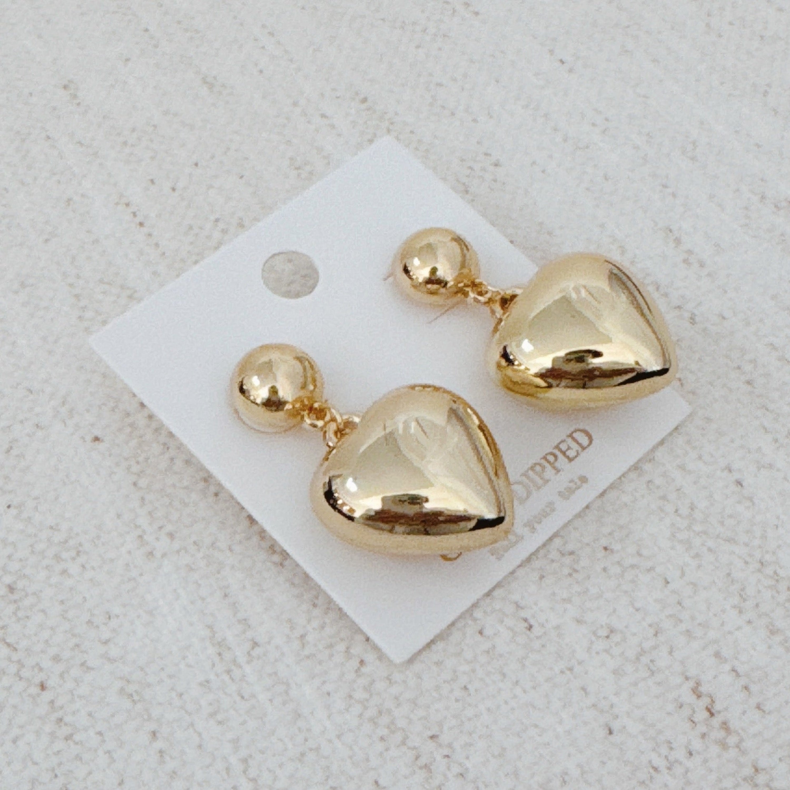 Puff Dangle Heart Earrings - close up of puffy heart dangle detail
