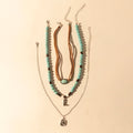 Myra Cody Charm Layered Necklace with turquoise beads and horseshoe charm