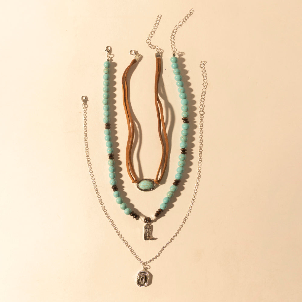 Myra Cody Charm Layered Necklace with turquoise beads and horseshoe charm