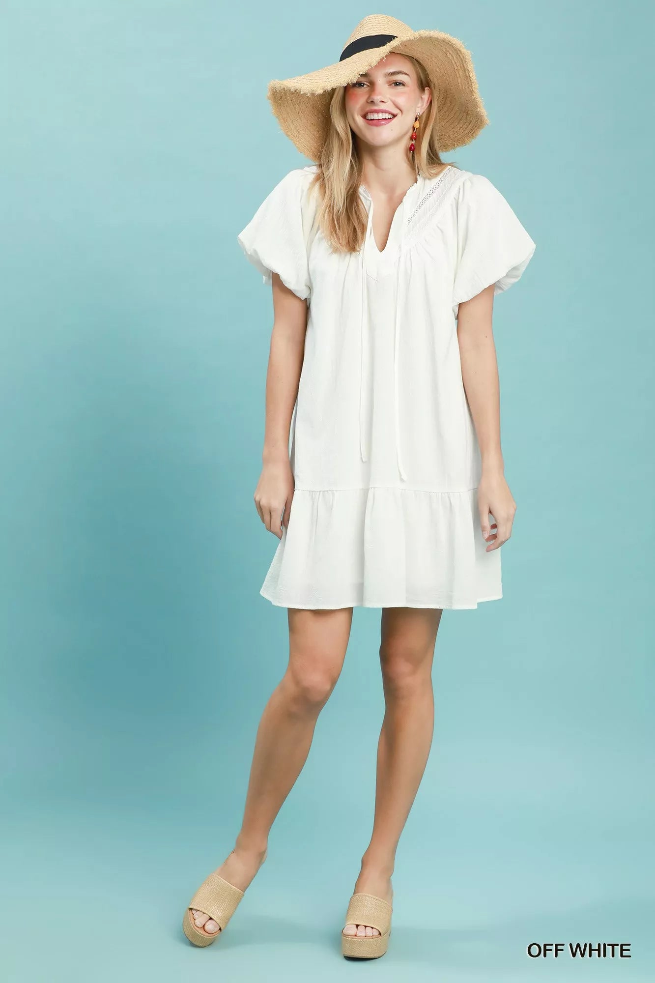 Umgee Flutter Sleeve Tassel Tie Ruffle Hem Mini Dress - side view showing ruffle hem