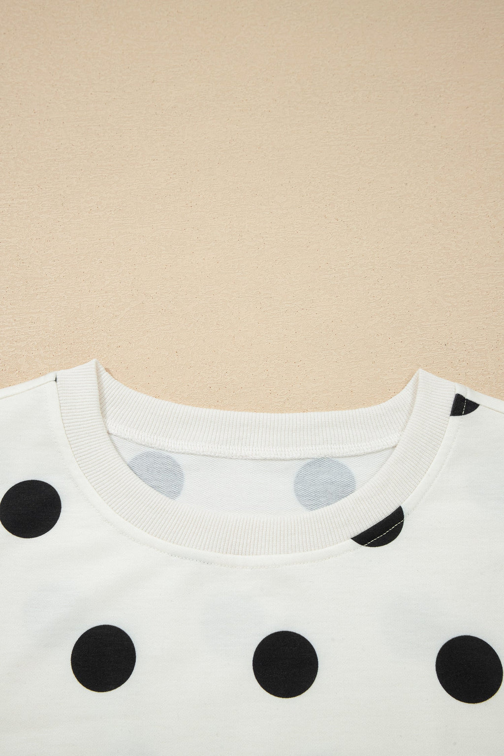 Polka Dot Ribbed Trim Tank and Mini Skort Set in White with polka dot print, ribbed trim tank top, and split mini skort shown on model