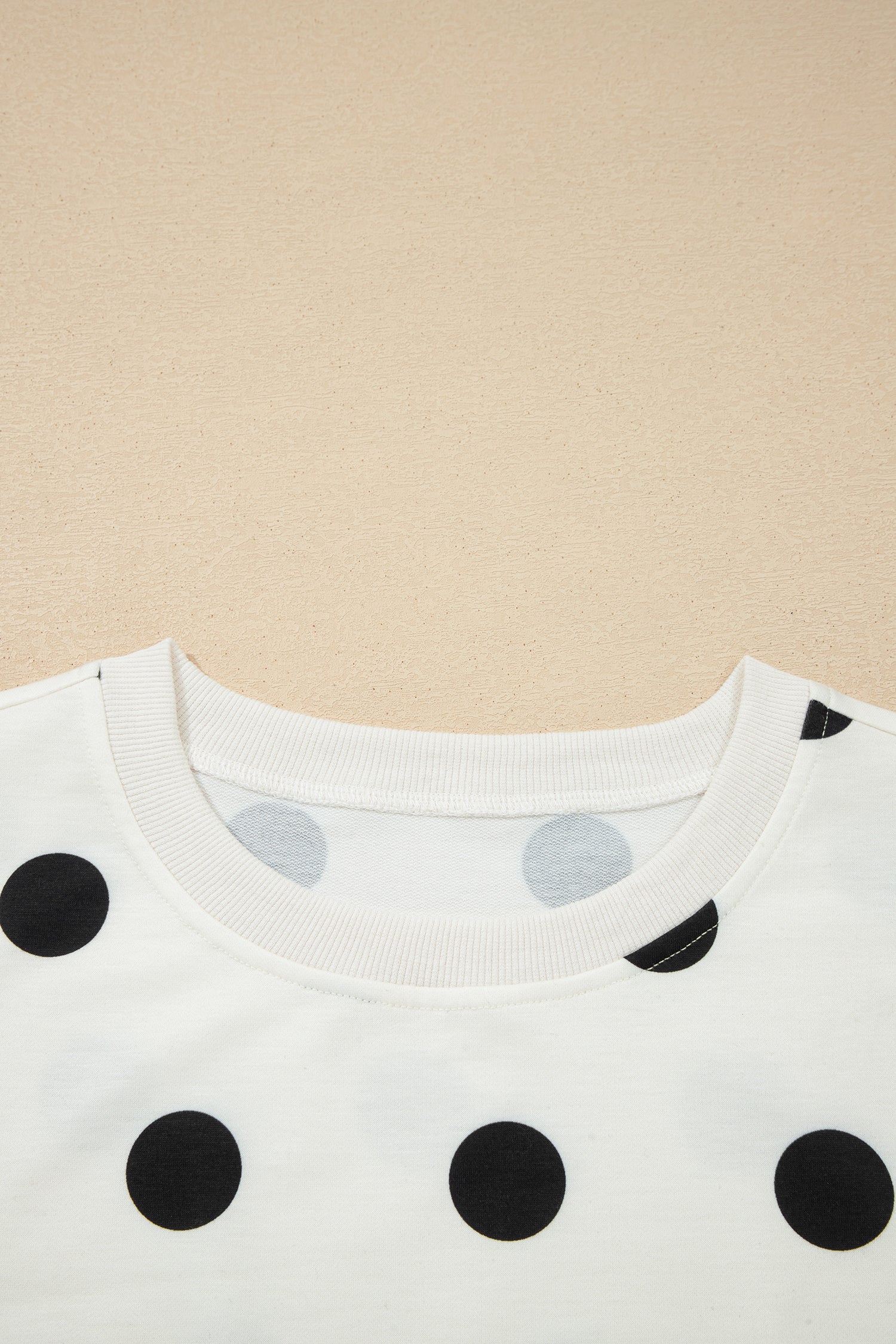 Polka Dot Ribbed Trim Tank and Mini Skort Set in White with polka dot print, ribbed trim tank top, and split mini skort shown on model