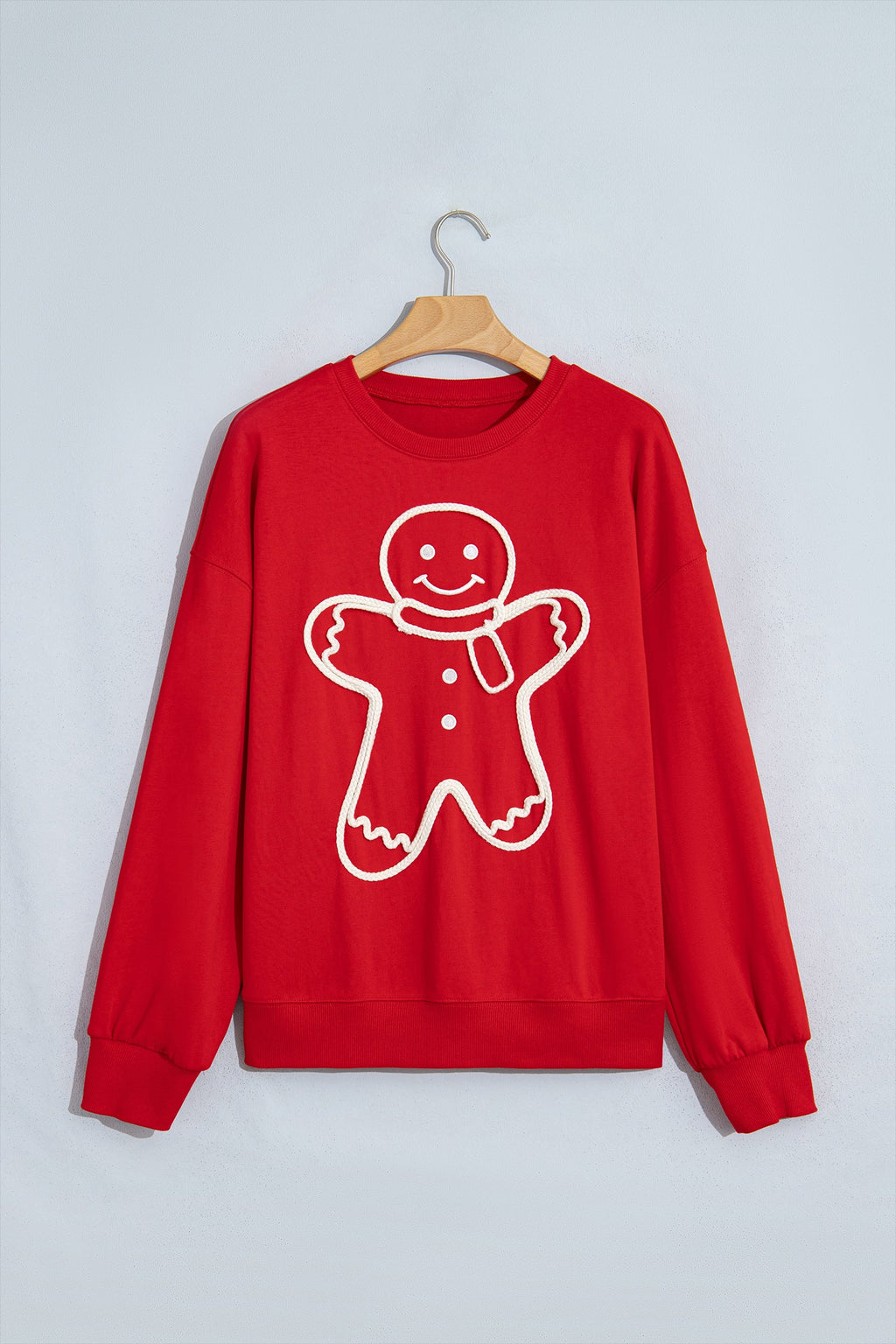 Christmas Gingerbread Embroidered Sweatshirt in fiery red, detail view