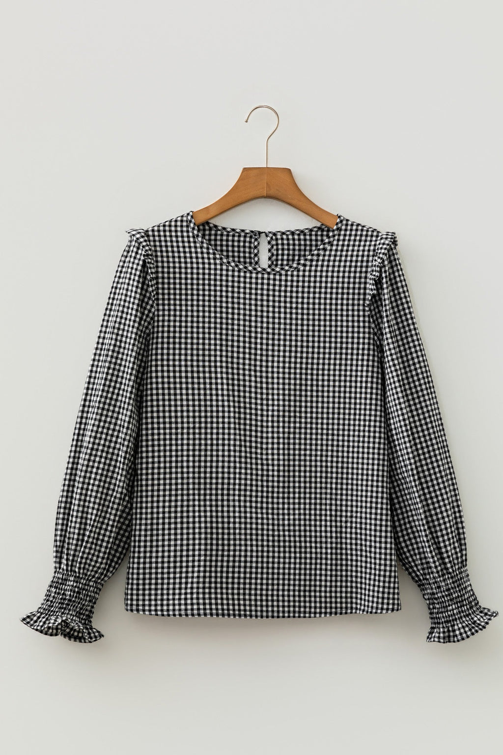 Black gingham blouse ruffled shoulder detail