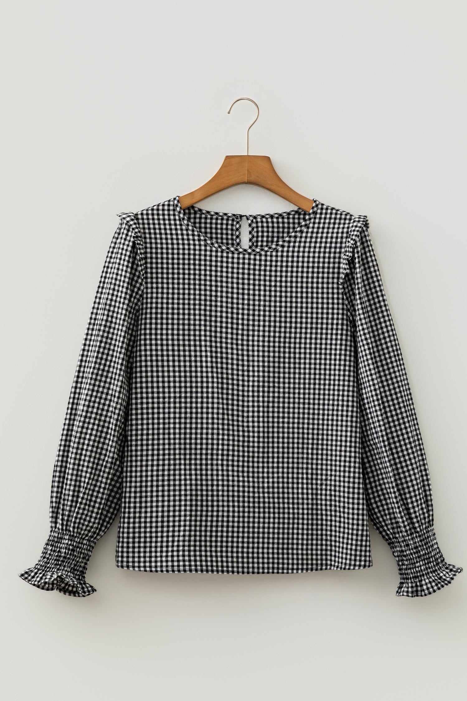 Black gingham blouse ruffled shoulder detail