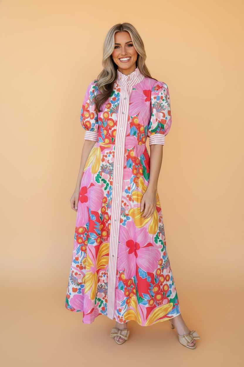 Floral Stripe Trim Puff Sleeve Buttoned Maxi Dress in Pink with floral print, stand collar, contrast stripe cuffs, and side pockets shown on model