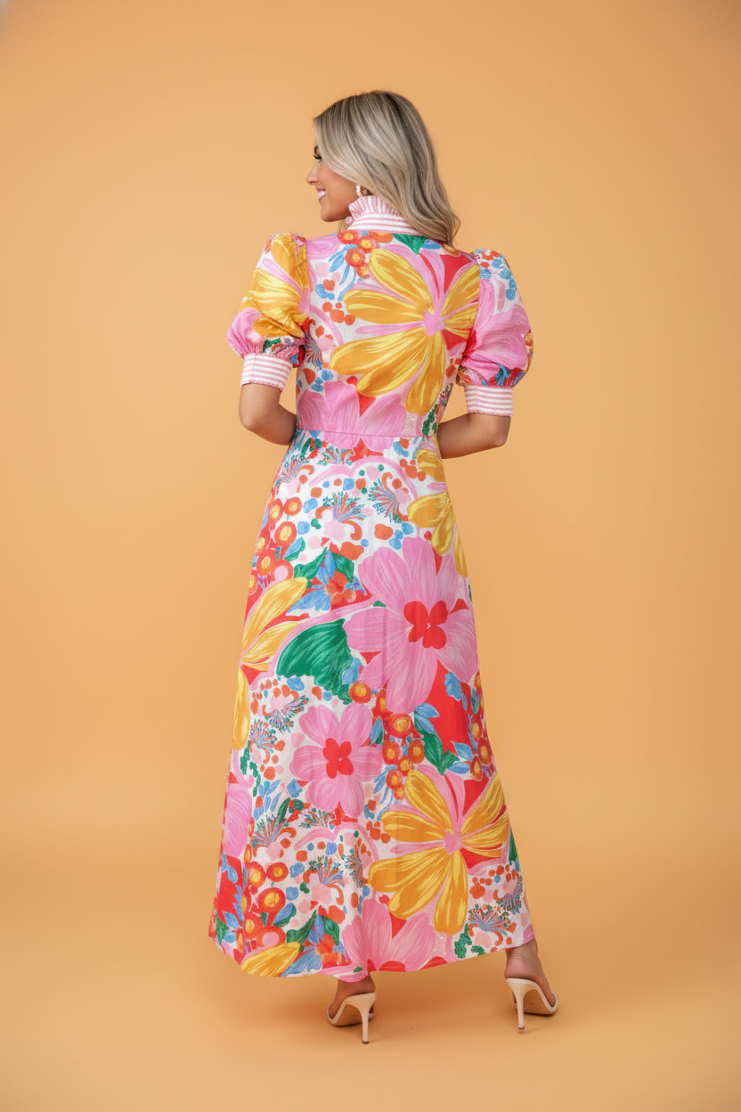 Floral Stripe Trim Puff Sleeve Buttoned Maxi Dress in Pink with floral print, stand collar, contrast stripe cuffs, and side pockets shown on model
