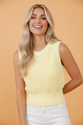 Solid Cropped Tie Back Cutout Sweater Knit Tank in Yellow Cream - front view showing sleeveless crop silhouette