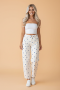 Polka Dot Tailored Seam Ankle Length Jeans in Blue - front view showing barrel leg silhouette