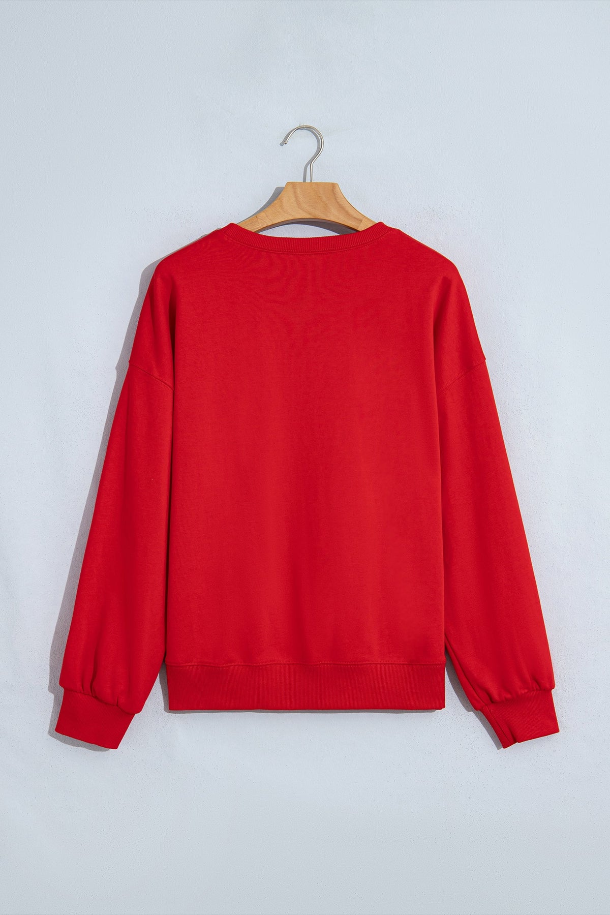Christmas Gingerbread Embroidered Sweatshirt in fiery red, styled view