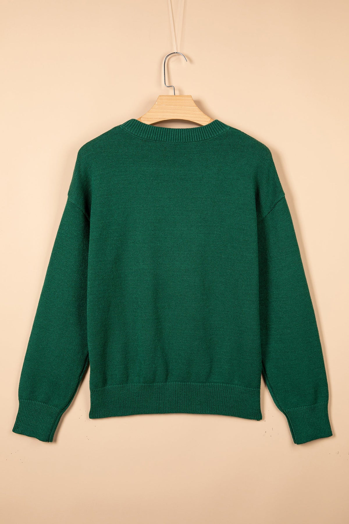 Christmas Dog Embroidered Sweater in blackish green, styled view