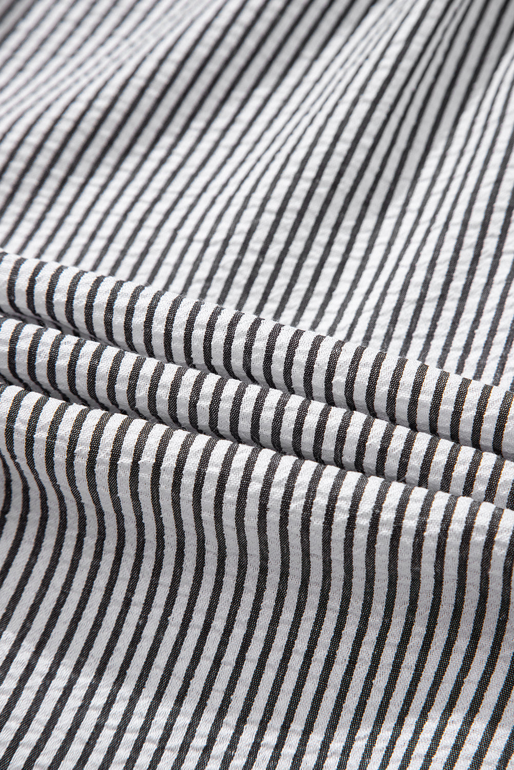 Black striped shirt fabric detail