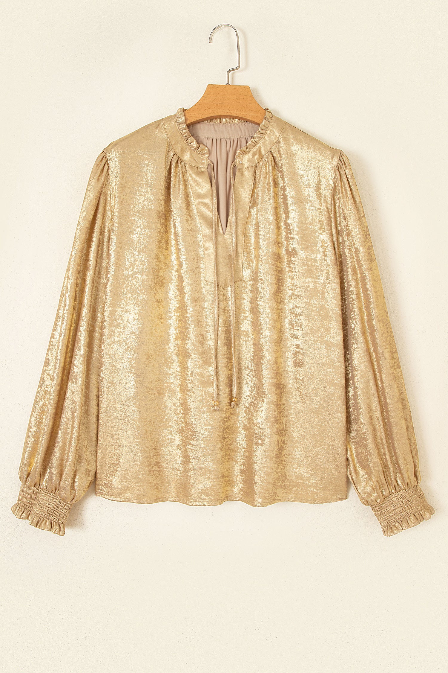 Gold metallic blouse elastic cuff detail