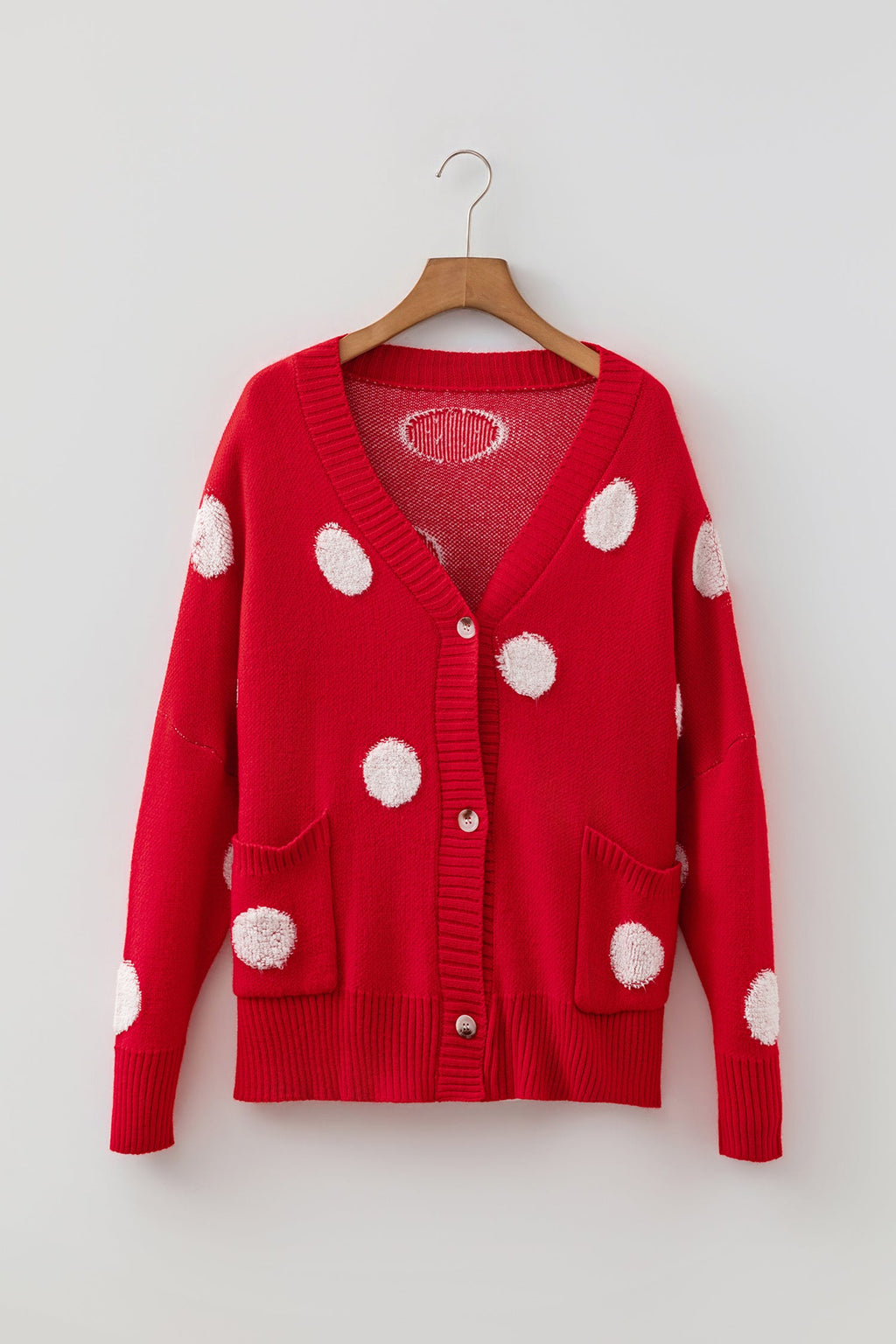 Polka dot cardigan V-neckline close-up