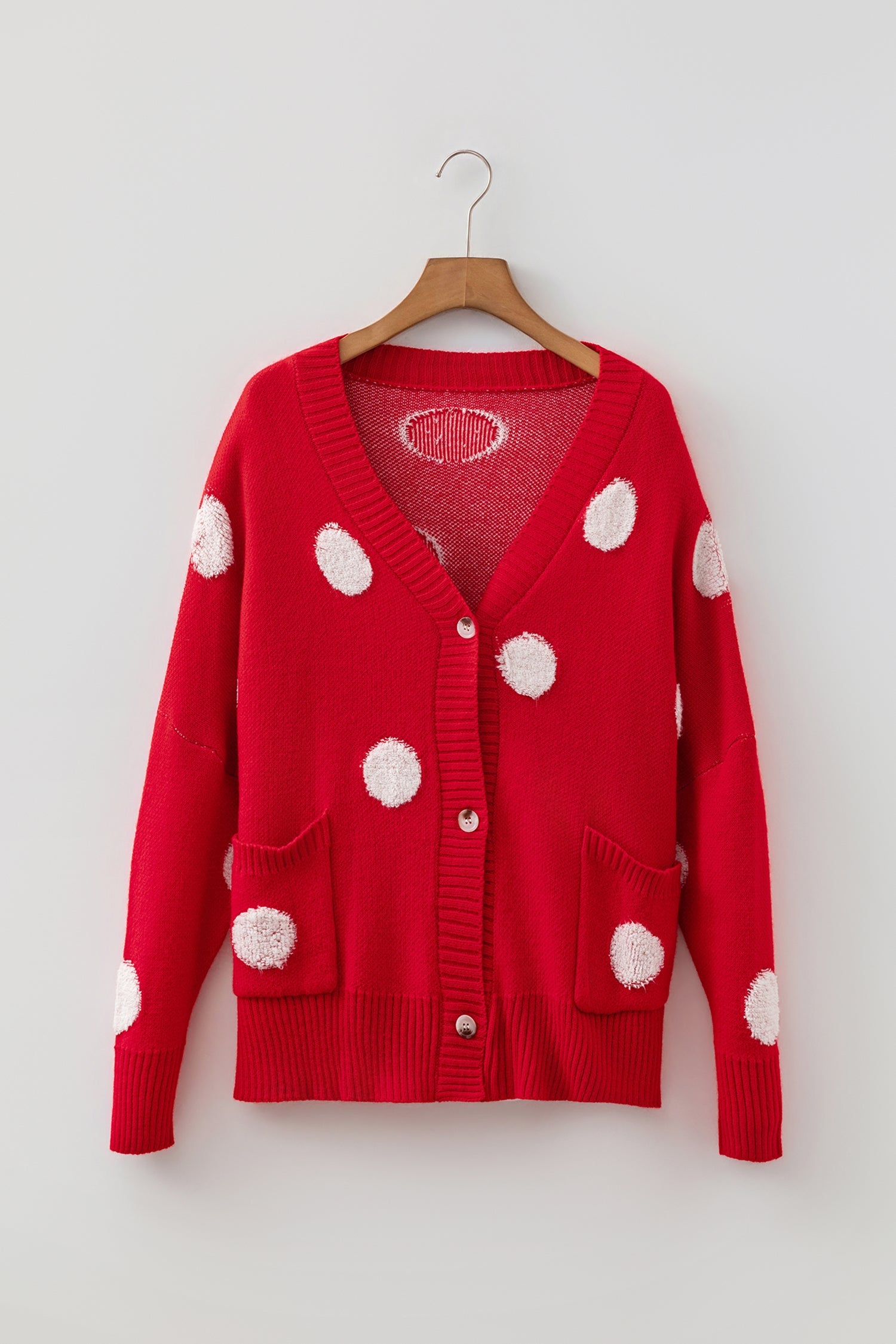 Polka dot cardigan V-neckline close-up