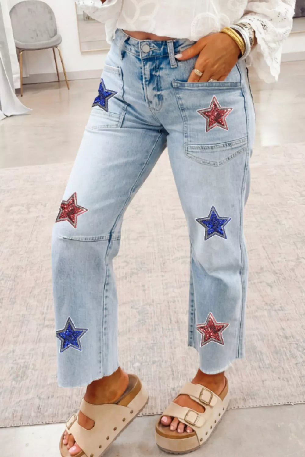 Star-Embellished Cropped Jeans in Light Blue - front view showing star sequin detail