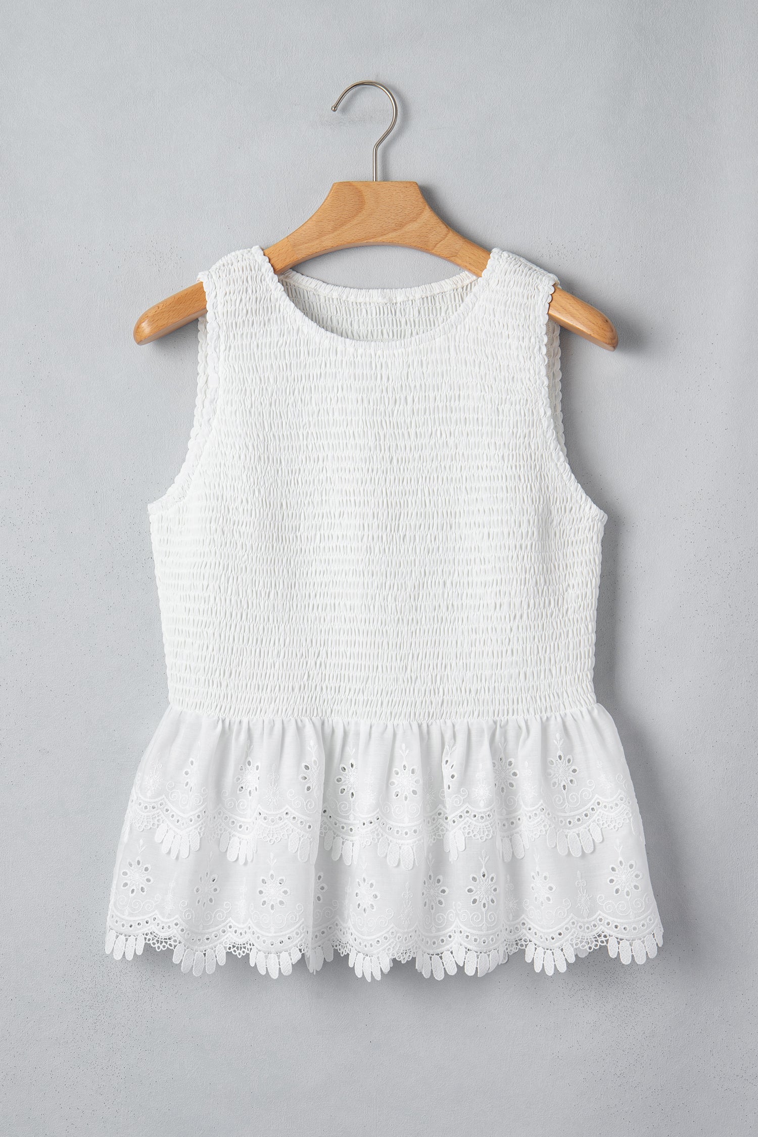 White peplum top eyelet lace hem detail