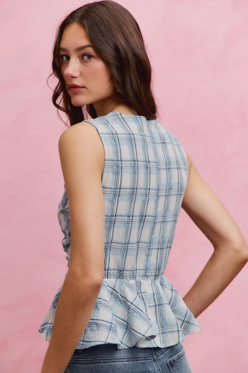 SO ME Plaid Sleeveless Ruffle Peplum Top - close up of plaid fabric and ruffle detail