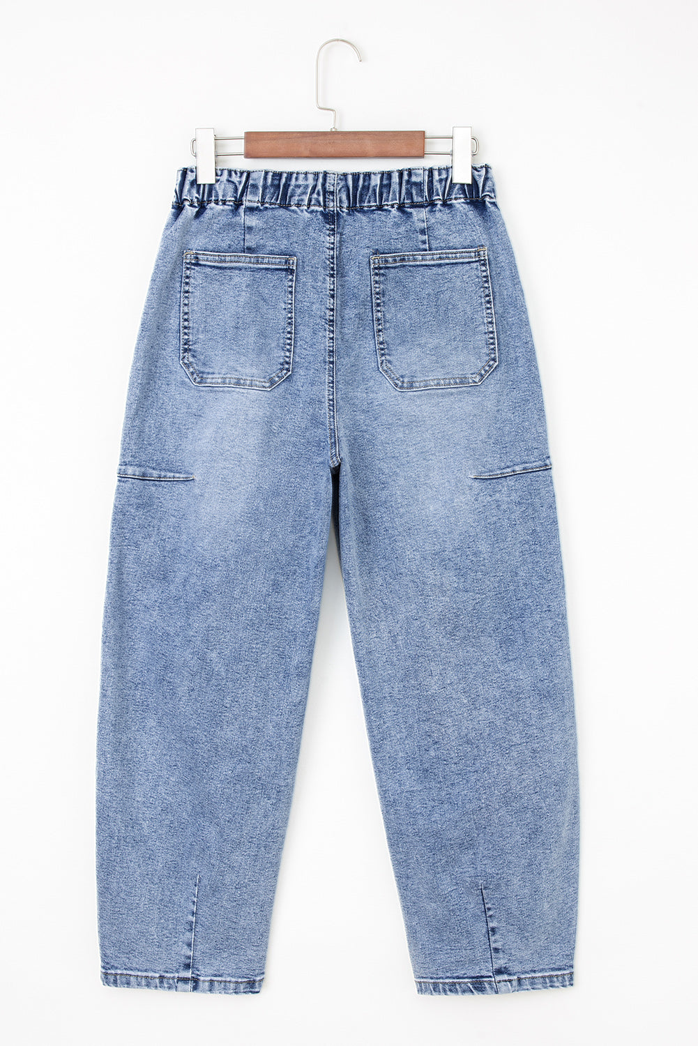 Barrel jeans exposed seam and medium wash denim detail