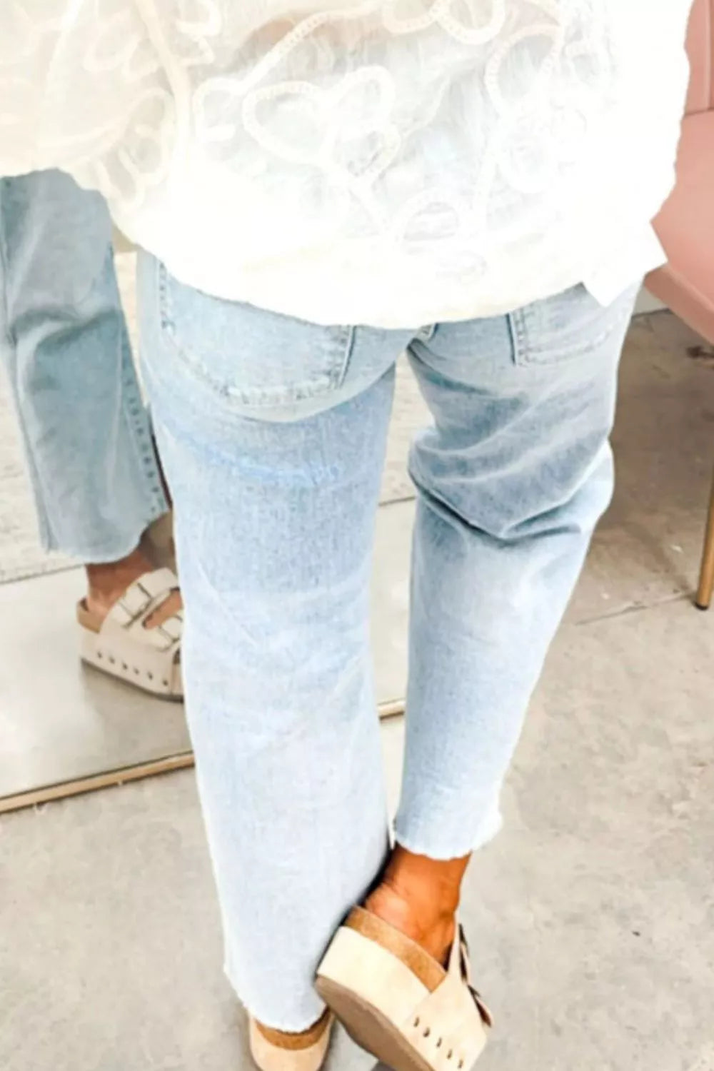 Star-Embellished Cropped Jeans in Light Blue - close up of star embellishments