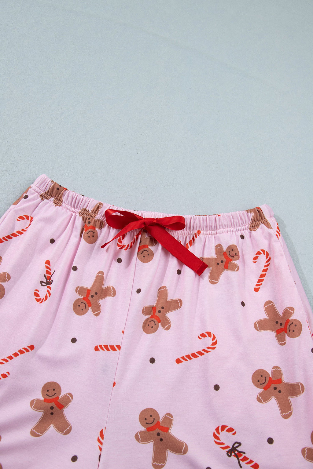 Christmas Gingerbread Top and Shorts Pajama Set in Pink, close-up print detail