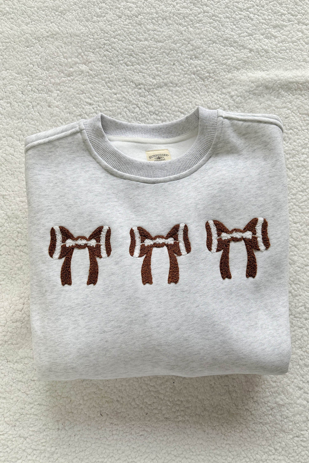 Gray game day sweatshirt ribbed cuffs and hem detail