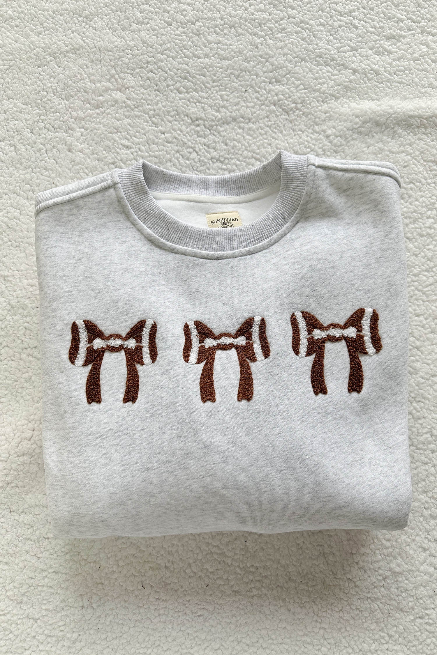 Gray game day sweatshirt ribbed cuffs and hem detail