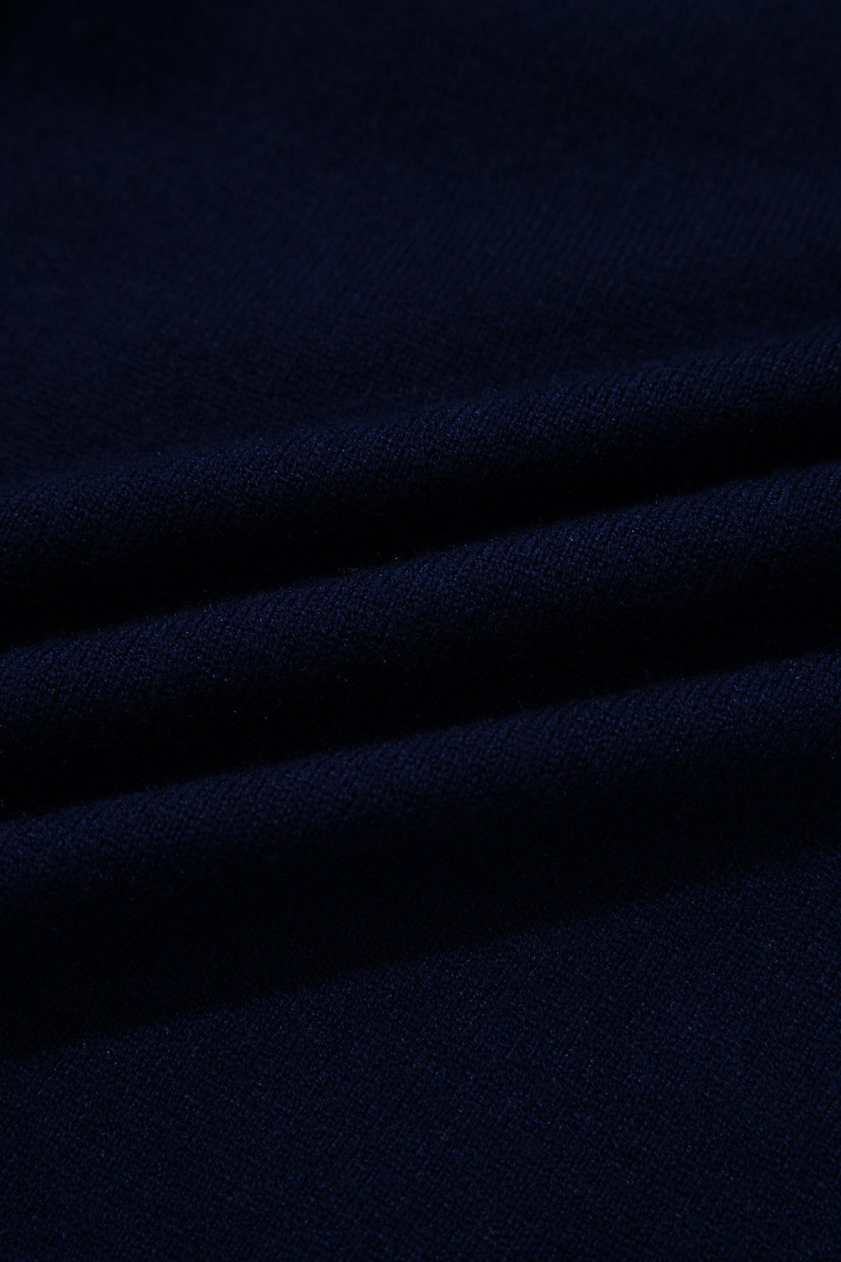 Stripe Patchwork Drop Shoulder Sweater in navy blue, worn