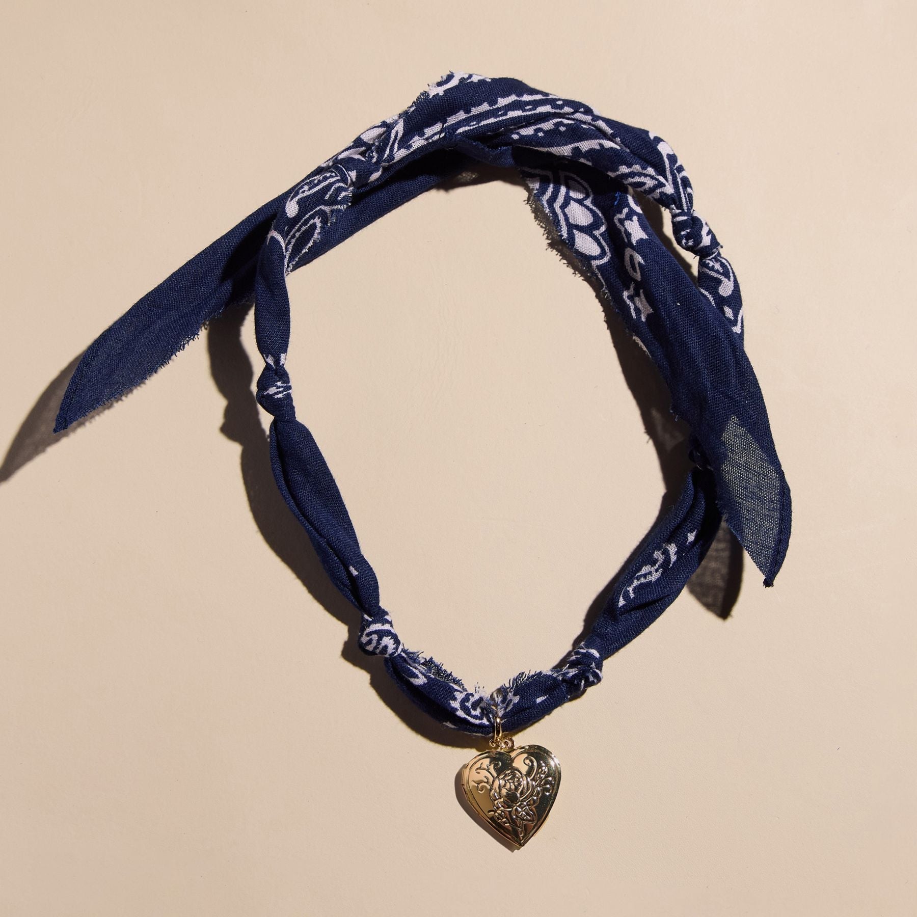 Navy Bandana Charm Necklace - close up of bandana knot and charm detail